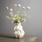 Set of 6 golden and golden-white seashell metal sticks arranged in a neutral-toned setting, styled with pampas grass and dry flowers for a soft, beachy vibe.