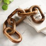 Wooden chain decor with 5 knots on books, handcrafted rustic home accent