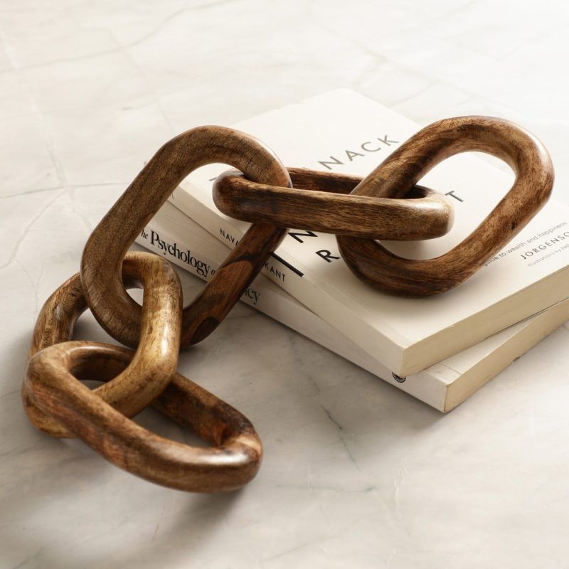 Handmade wooden chain decor, 5-link table accessory for modern homes.