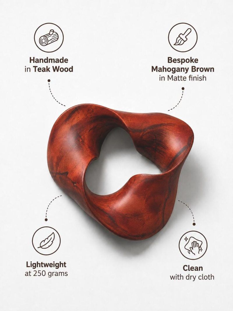 Infographic detailing the features of The Trinity Knot by Glimpse Homes: handmade in teak wood, bespoke mahogany brown matte finish, lightweight at 250 grams, and clean with a dry cloth.