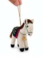 Hand holding a felt horse ornament for nursery decor by Glimpse Homes