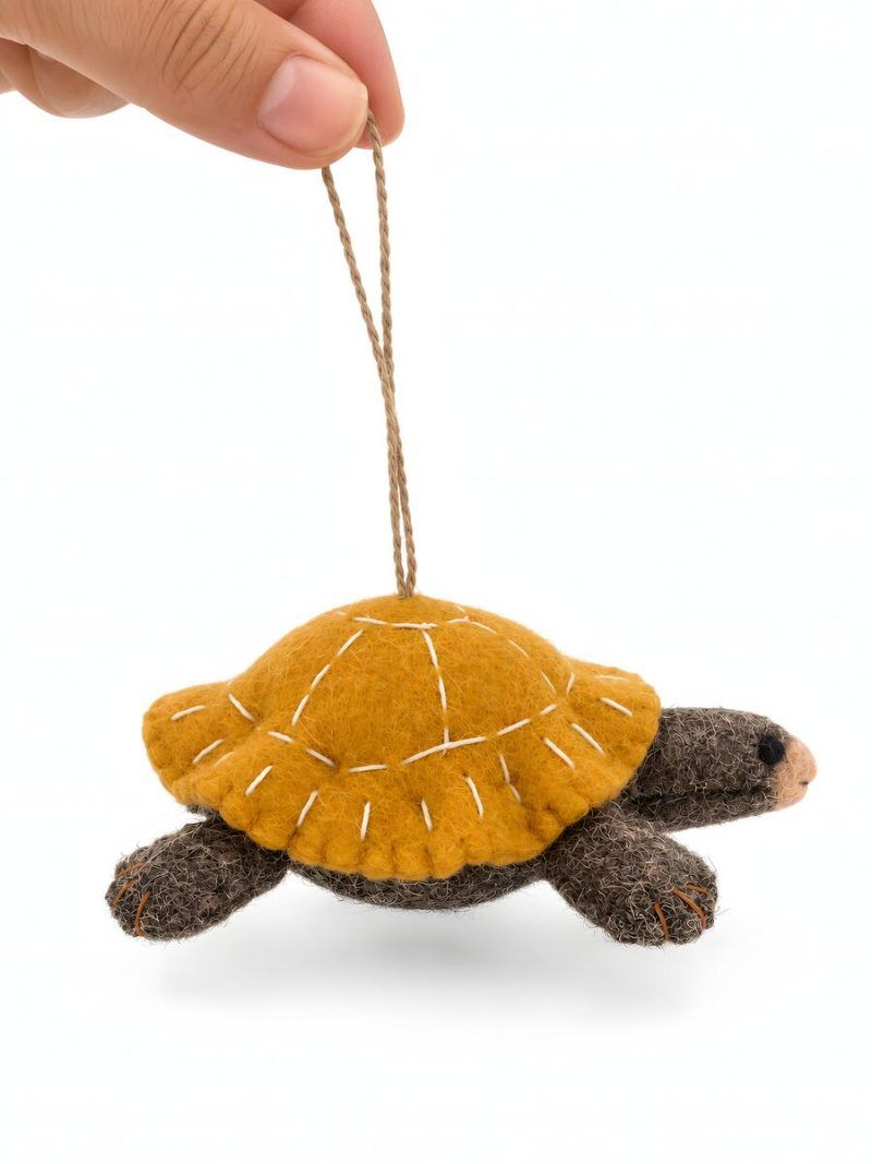 Glimpse Homes felt tortoise ornament with stitched yellow shell, side profile