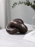 Walnut wood knot chain table decor by Glimpse Homes styled on marble table with eucalyptus.