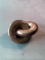 Glimpse Homes wooden knot chain decor in walnut finish, handcrafted interlocking sculpture for home decor.